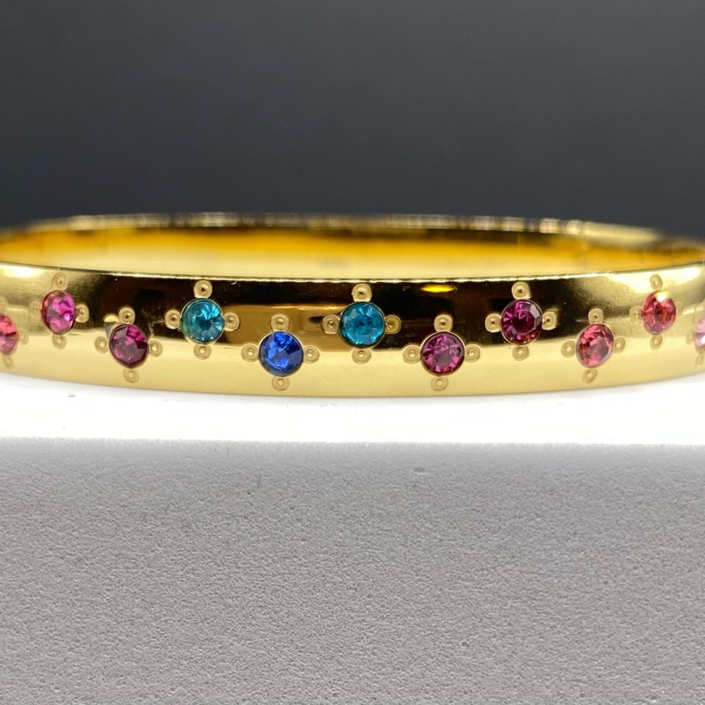 Elegant Gold Bracelet with Blue and Pink Accents